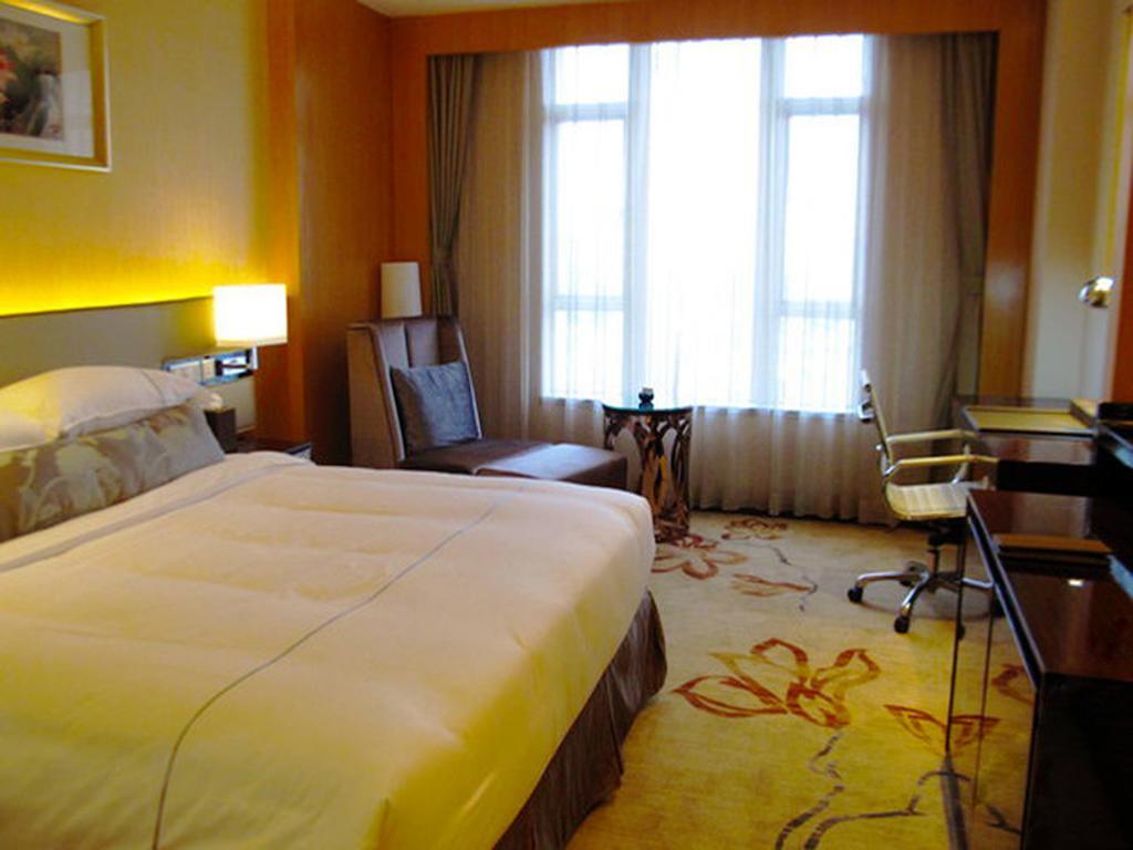 Guangzhou Manguo Internation Hotel Quarto foto